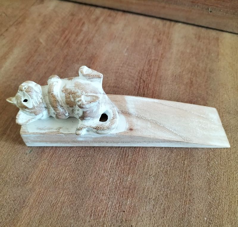 Hand carved Doorstop - Poes