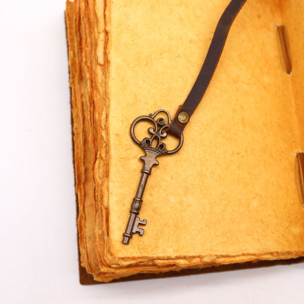 Geolied leer en sleutel - 200 pagina's met platte randen - 13x18cm