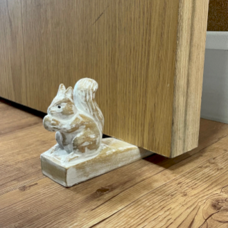 Handgesneden Deurstoppers