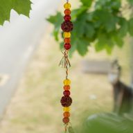 Indische belletjes - Messing Bloem des Levens met Rudraksha-kralen - Belletjes aan een koord - 6x63cm