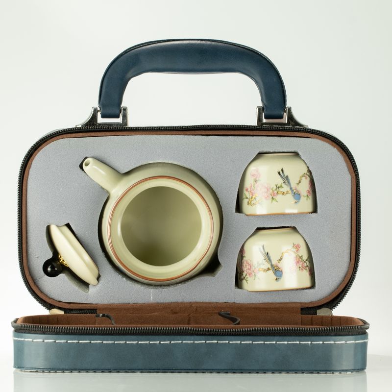 Reis-theepotset en twee kopjes - Blauwe Vogel Qing-dynastie