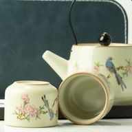 Reis-theepotset en twee kopjes - Blauwe Vogel Qing-dynastie