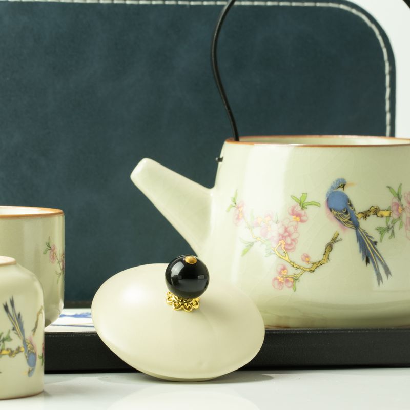 Reis-theepotset en twee kopjes - Blauwe Vogel Qing-dynastie