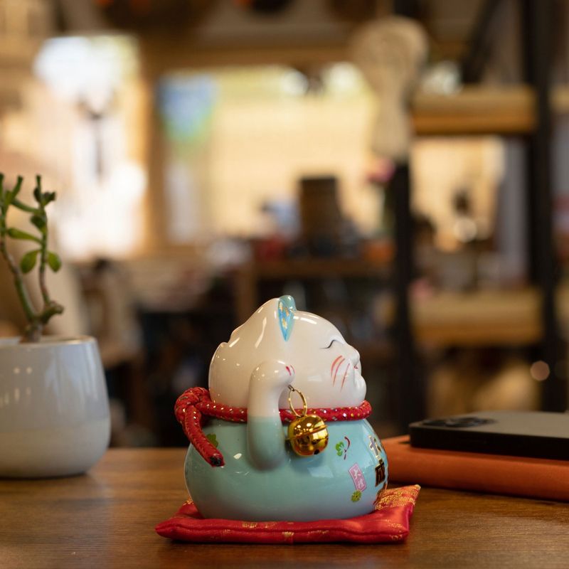 Keramische Gelukskat Spaarpot - Blauw op Kussentje